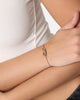 Guess Mainline Women's Modern Love Central Knot Bracelet Yellow Gold