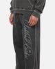 Mitchell & Ness Las Vegas Raiders Star Script Relaxed Track Pants Washed Black