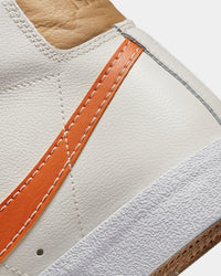 Nike Blazer Mid '77 EMB "Inspected By Swoosh" Phantom/Hot Curry-Pearl White